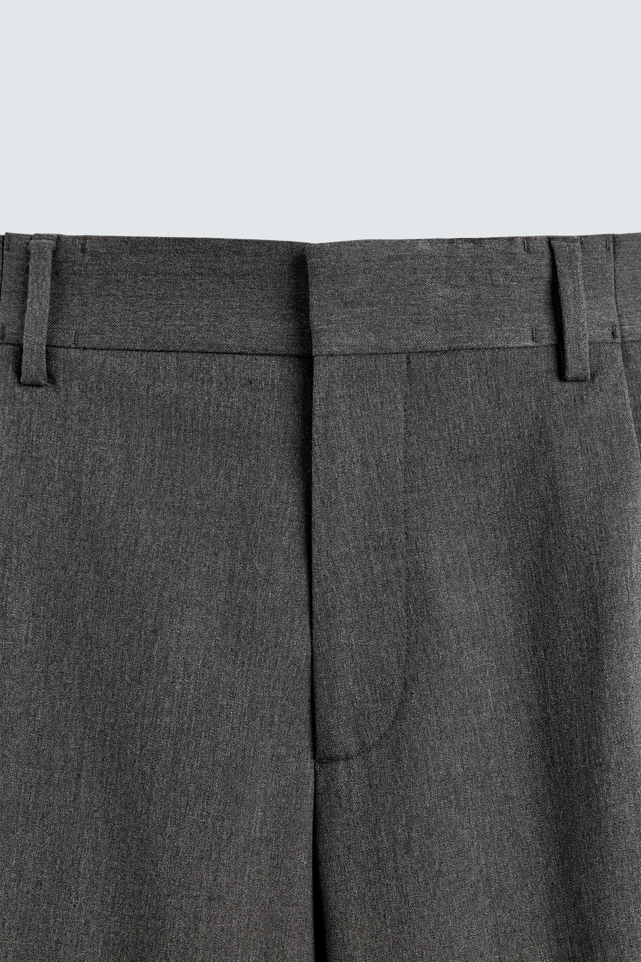 PLEATED WIDE FIT PANTS